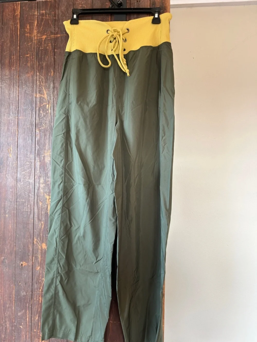 FP Movement by Free People Olive Green Wide-Leg Joggers with Yellow Rib Waist - Picture 1 of 6